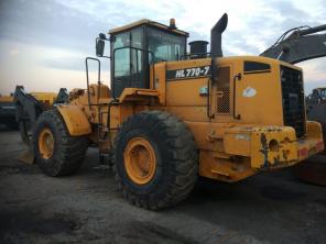 колесный погрузчик с лесным захватом Hyundai HL770-7