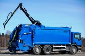 Кран HIAB на мусоровозе для заглубленных контейнеров.