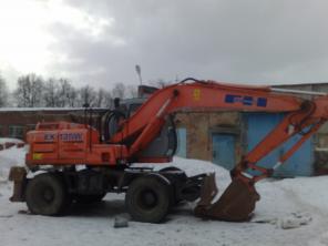 Колесный экскаватор FIAT HITACHI EX135W 2002 года выпуска, объем ковша 0,85 куба, гидромолот, наработка min, состояние отличное, продается срочно, торг