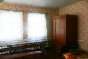 Дом с участком 15 соток, огорожен забором из металлопрофиля