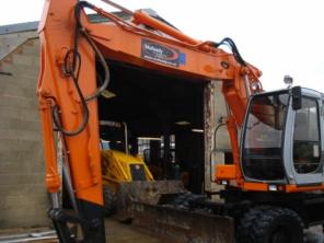 Экскаватор колесный Hitachi EX165W, 2002года.