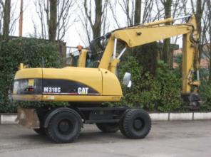 Колесный экскаватор Caterpillar M 318 C Год выпуска:2004