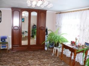 Добротный дом с блочной пристройкой и участком 18 соток