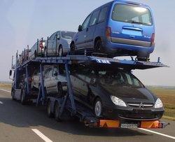 Перевозки автомобилей автовозами.