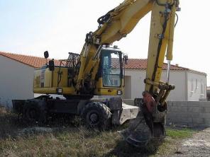 Экскаватор колесный Komatsu PW180-7, 2006 года.