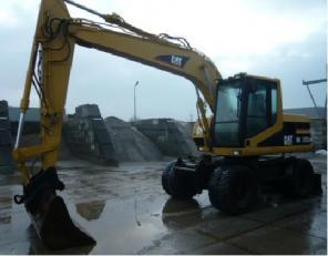 Колесный экскаватор Caterpillar