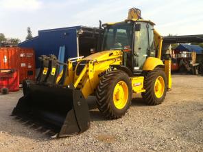 Экскаватор погрузчик komatsu 97S5 2008 состояние нового