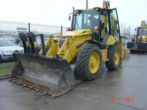 Экскаватор погрузчик Komatsu WB 97S 2009 г. состояние нового , из Европы, доставка по РФ