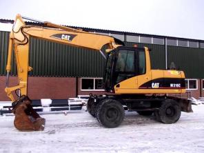 Caterpillar M316C- колесный экскаватор