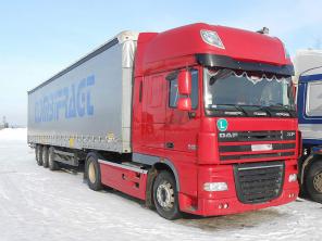 DAF XF 105.460 2009 г + прицеп schmitz S01 2006 г