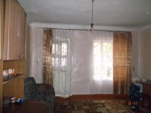 Продам 2к неблаг. квартиру на Оцимика