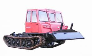 Шасси трелевочного трактора МСН-10. Трехместная кабина новой модели.