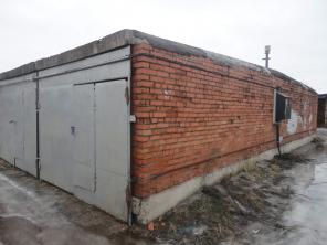 Продам кирпичный гараж 18м. в центре.
