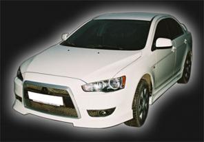 Обвес(Тюнинг) на Mitsubishi Lancer-X (юбка передняя,юбка задняя,спойлер,накладка на пороги ,реснички )