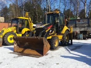Экскаватор-погрузчик Caterpillar 428E