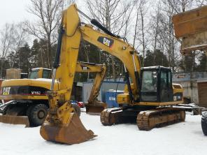 Экскаватор гусеничный Caterpillar 319DLN в габарите