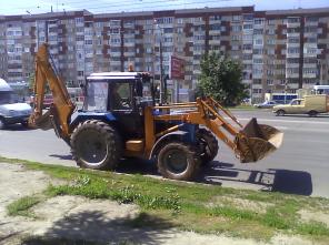 Продам Экскаватор-погрузчик Амкодор 702 ЕА. Отличное состояние.